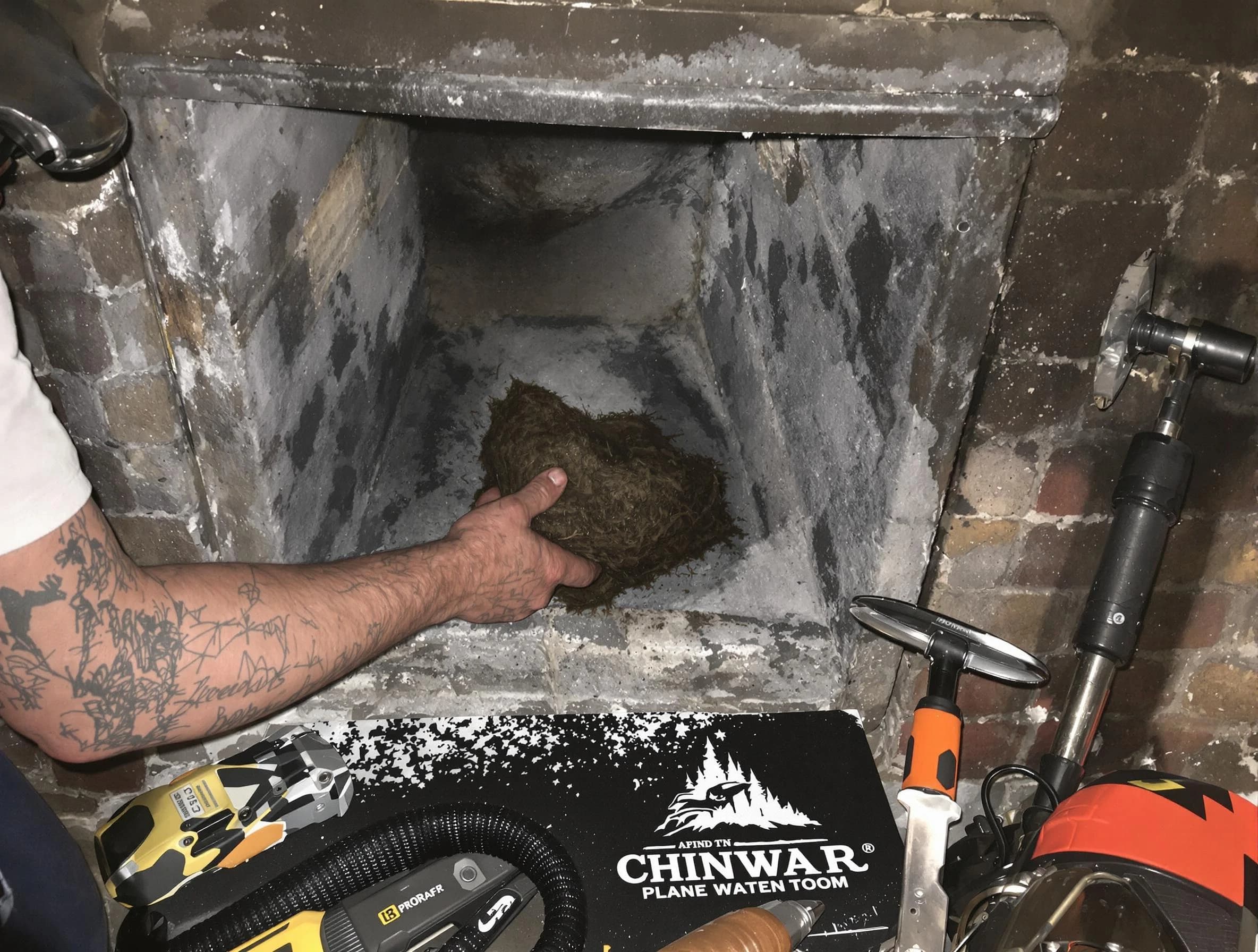 Choctaw Chimney Sweep safely removing debris and screening chimney in Choctaw, OK